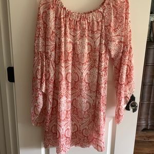 Coral color boutique dress.